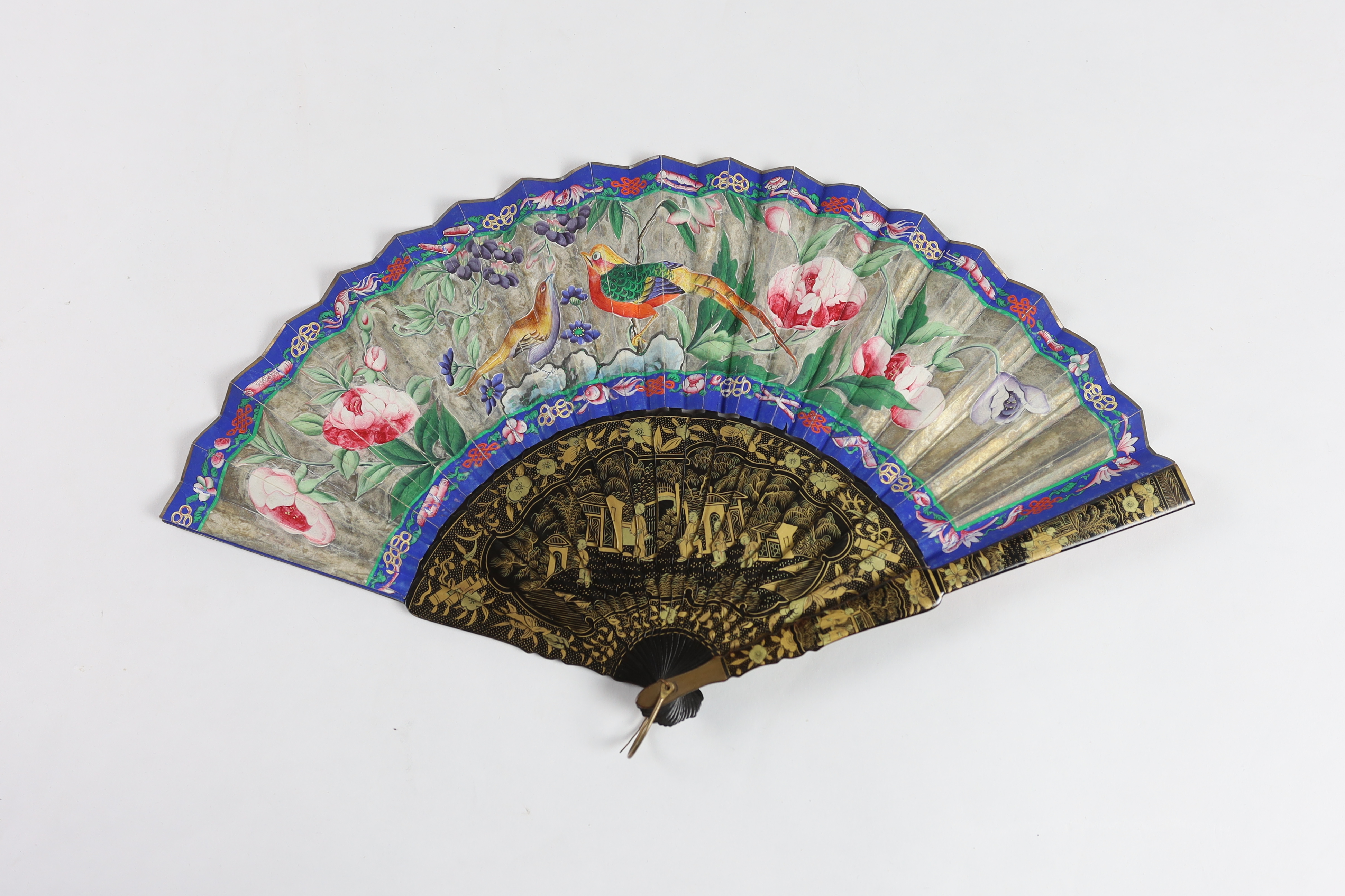 A 19th century Chinese ornately lacquered and hand painted figural leaf fan, the figures on the leaf having painted ivory faces, the back of the fan painted with exotic birds and flowers, CITES Submission reference TJUZX